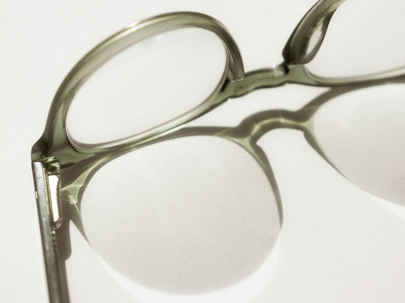Translucent green acetate frame, close up